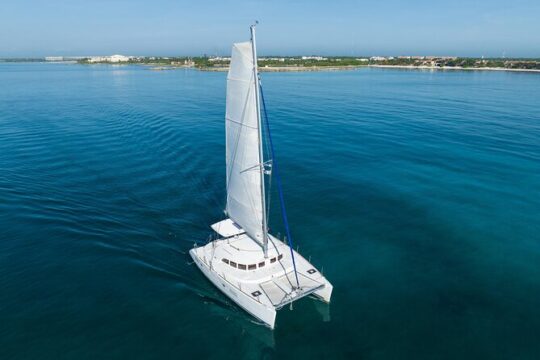 8-Hour Private 38' Catamaran 2-stop Tour to Cozumel with Food,Open Bar & Snorkel